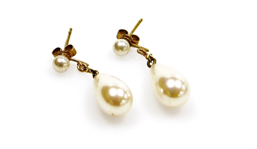 A pair of 9ct gold cultured pearl drop earrings, each with a pearl drop and pearl stud with gold cha