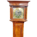 A Georgian flame mahogany long case clock by Thomas Simpson of Durham, square brass dial with spandr