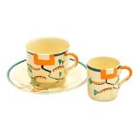 A Clarice Cliff Bizarre Ravel pattern teacup and saucer, each piece hand painted with an abstract de