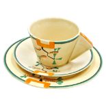 A Clarice Cliff Bizarre Ravel pattern trio, comprising teacup with angular handle, saucer and plate,