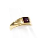 A 9ct gold dress ring, with square set amethyst, in a rub over setting, ring size M, 3.7g all in.