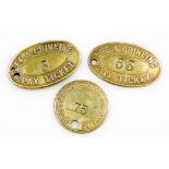 Two Lee and Grinling of Grantham double sided brass pay tags or tickets, each oval and bearing numbe