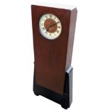 An Art Deco mahogany and ebonised grandmother clock, circular dial bearing Roman numerals, thirty ho