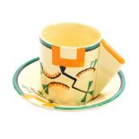 A Clarice Cliff Bizarre Ravel pattern coffee can and saucer, the coffee can with an angular handle,