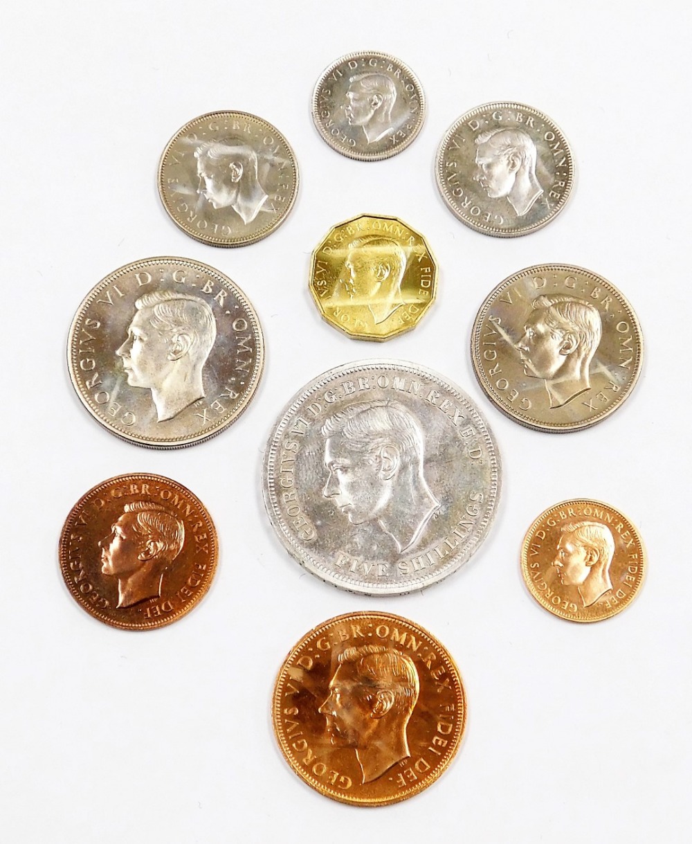 A Festival of Britain 1951 coin set, ten coins, crown to half penny, in a gilt tooled green faux sha - Image 3 of 4