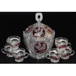 An Eastern European cut and ruby flash glass punch set, decorated with birds, comprising punch bowl