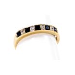 A 9ct gold half hoop dress ring, set with five square cut sapphires and four tiny diamonds, ring siz