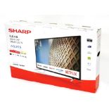 A Sharp Aquos 40" smart LED TV, 40BG2KE, boxed.