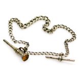A Victorian silver Albert watch chain and T bar, attached with a slender trumpet shaped pendant fob/