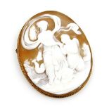 A 9ct gold framed oval cameo brooch, with a rope twist outer border and cameo depicting male and fem