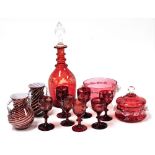 A late 19thC Continental ruby glass decanter with clear glass stopper, etched with scrolling vines,