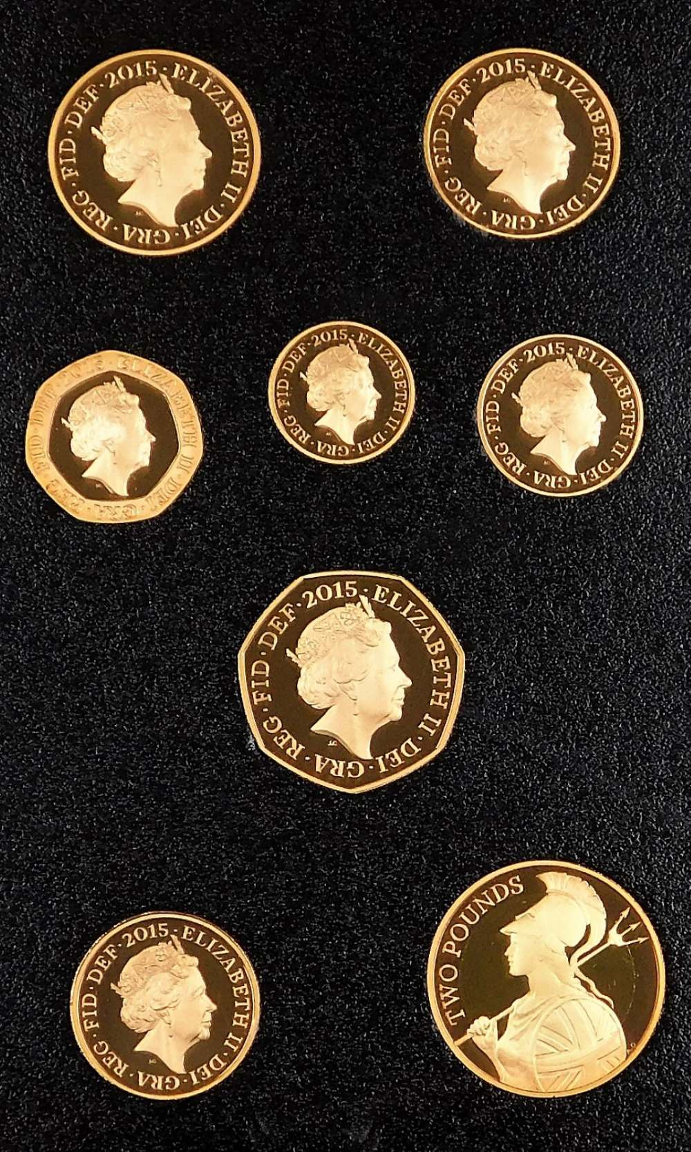 An Elizabeth II 2015 gold proof coin set, number 150, to commemorate the fifth circulating coinage p - Image 3 of 3