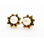A pair of 9ct gold cultured pearl earrings, with abstract floral design and central cultured pearl w