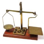 A pair of DeGrave Short and Company Ltd GPO brass scales, with weights.