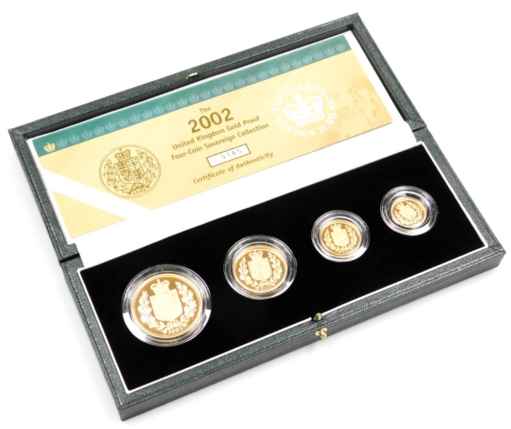 An Elizabeth II 2002 gold proof four coin sovereign collection, number 185, comprising five pound co