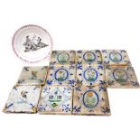 A set of ten French pottery fire side tiles, decorated centrally with flowers in an oval surround, f
