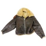 A WWII USAAF Air Force leather flying jacket (B3), size unknown, faint remains of personnel name to