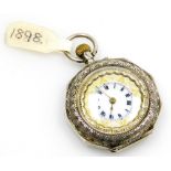 A late 19thC Swiss white metal pocket watch, of octagonal form, open faced, keyless wind, the case e