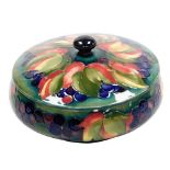 A Moorcroft pottery Leaf and Berry pattern powder bowl and cover, of circular form, impressed marks,