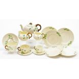 A Belleek porcelain part tea and coffee service decorated in the Shamrock pattern, sixth green mark,