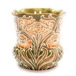 A Moorcroft Macintyre and Co Florian ware vase, with a lipped rim, decorated with orange flowers on