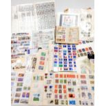 A group of mainly British Commonwealth used stamps, and an album of USA related stamps.