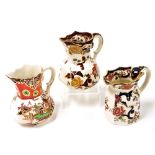 Three Masons Ironstone hydra jugs, decorated in the Oriental Garden, Mandalay and Brown Velvet patte