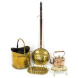 A Victorian brass coal bucket, copper and brass kettle, brass trivet, shovel, copper and brass bed w