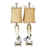 A pair of white metal woven thread and perspex table lamps, with mushroom colour shades, 93cm high.