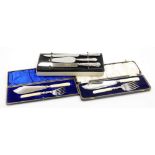 A set of three silver handled cake knives and slice, with stainless steel blade, each handle decorat