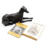 A bronze figure of a greyhound, modelled in recumbent pose, 36cm wide, together with H. Edwards Clar