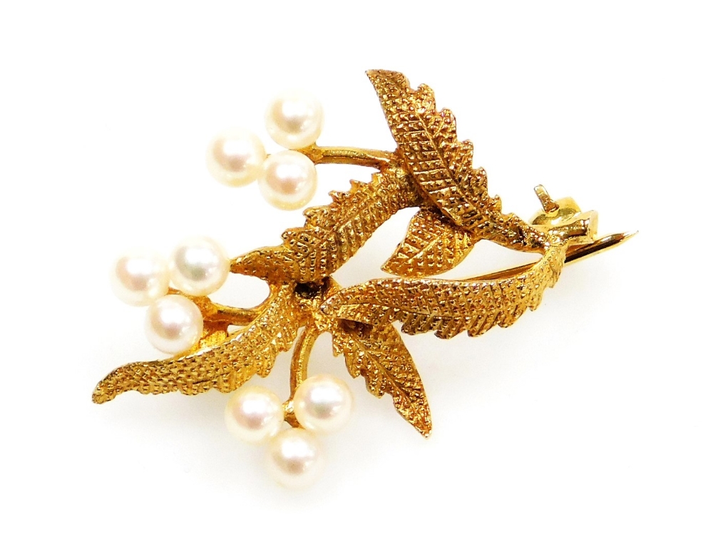 A 9ct gold leaf design brooch, set in three sprays with seed pearls, 3.5cm high, 4.1g all in, boxed.