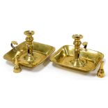 A pair of Victorian brass chamber sticks, each dish with raised sides and snuffers, 15cm high.