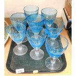 A set of eight blue and clear glass wine goblets, 15cm high.