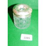 A silver mounted cut glass dressing table jar, 8cm high.