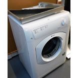 A Hotpoint Aquarius 7kg tumble drier, TVM570. Lots 1501 to 1557 are available to view and collect at