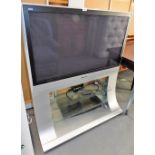 A Panasonic Viera 41" television, TH-42PX60V, with lead, TV stand and a Bose speaker, with remote.