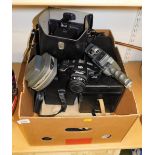 A Bell and Howell Autoset 624EE camera, a cased Polaroid camera, various camera cases, a Nikaiyo Mot