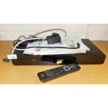 A Phillips blu-ray player, BDP3000, with leads and remote.