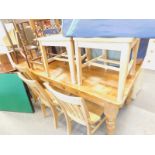 A Victorian style pine kitchen table, on turned tapering legs, the top 90cm x 183cm.