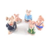 A Wade NatWest pig group, to include Maxwell, 19cm high and four others (5).