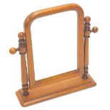 A pine dressing table mirror, on turned supports and rectangular base, 56cm high.