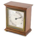 A Mappin and Webb mahogany cased mantel clock, with Elliot movement, silvered, 9cm wide back plate