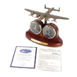 A Bradford Exchange 70th anniversary Lancaster Bomber clock, in original packaging, marked