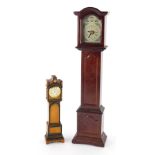 A 20thC miniature longcase clock, in mahogany finish case, Tempus Fugit type, 40cm high, and another