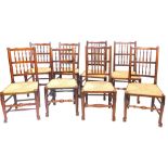 A harlequin set of eight Lancashire type spindle back dining chairs, comprising five 19thC chairs