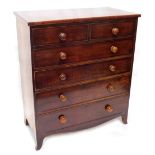 A Victorian mahogany chest of drawers, with plain top above two short and four long drawers, each