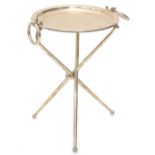 A silver plated two handled folding occasional table, on ball feet, 42cm high, the circular top 34cm