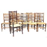 A harlequin set of ten 19thC Lancashire spindle back chairs, each with a rush seat, one with arms.