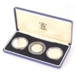 A 1991-1995 World War II 50th Anniversary three coin set, cased with paperwork.